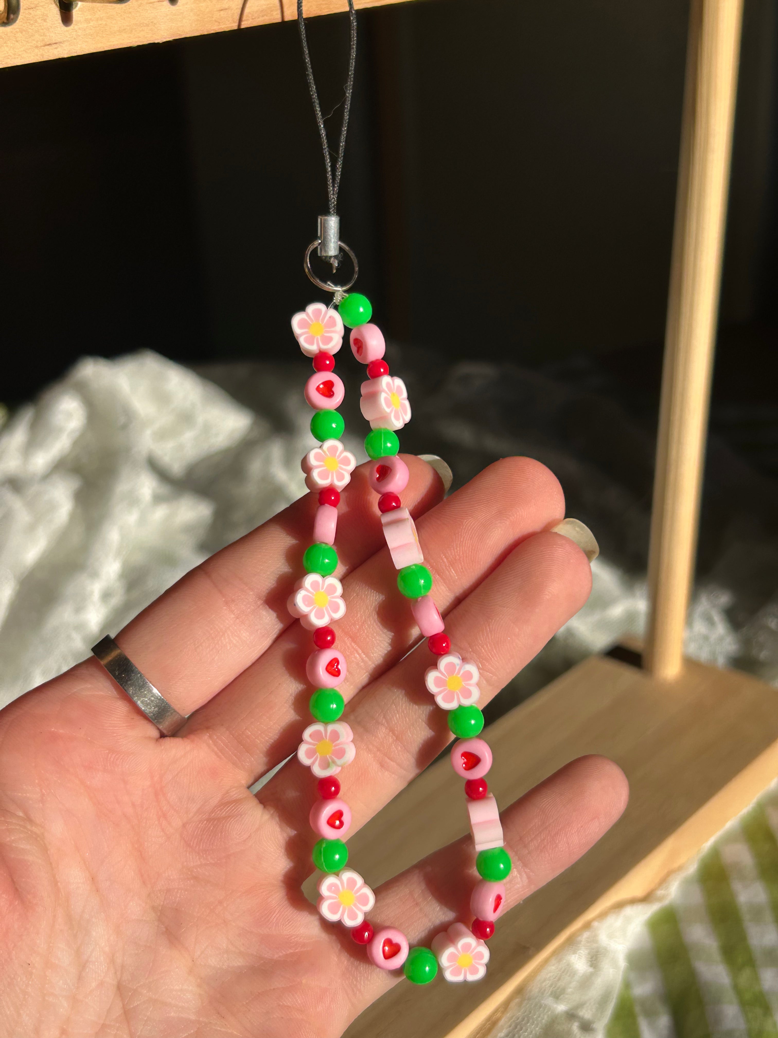 Bijou pour téléphone en perles