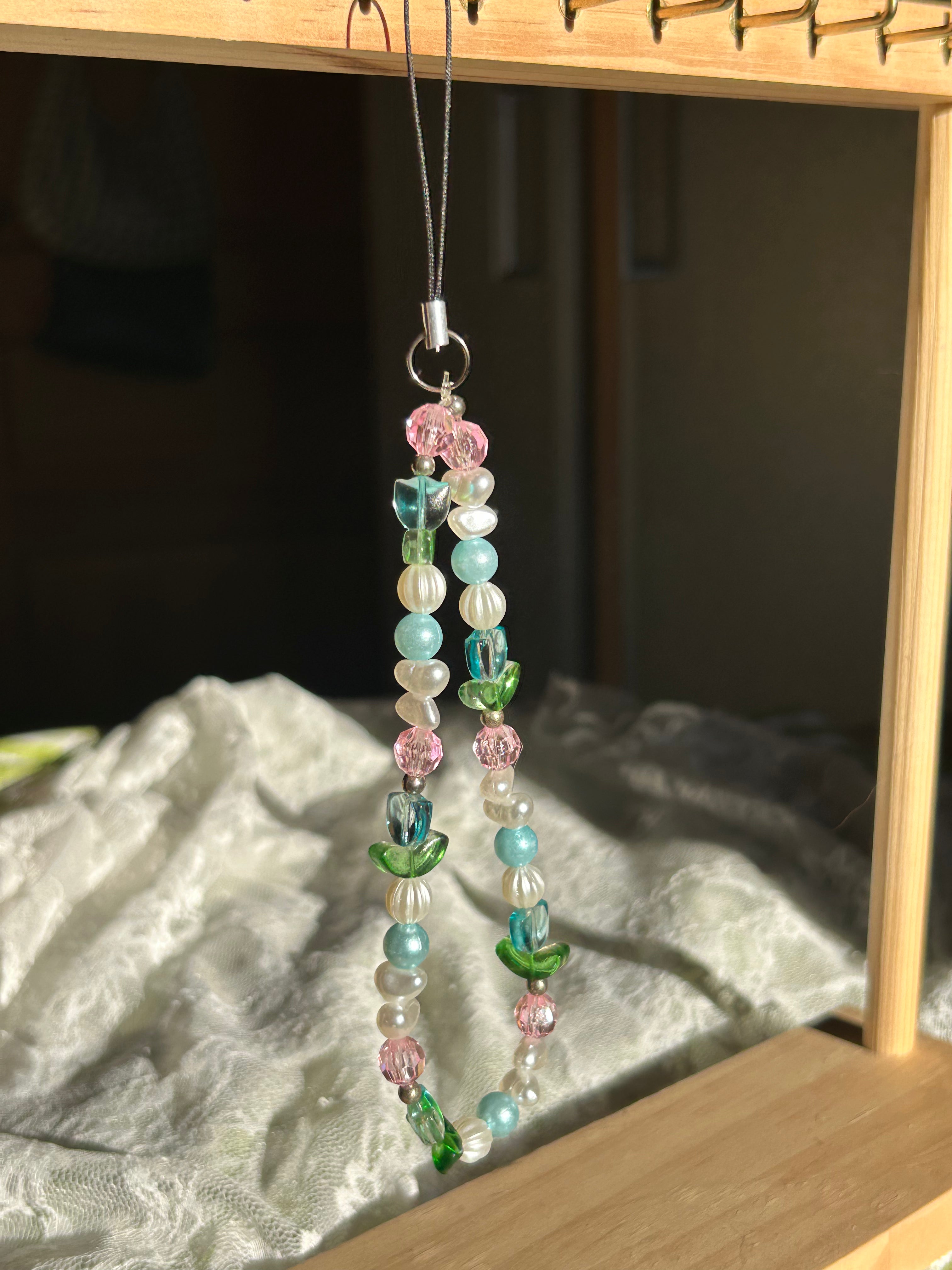 Bijou pour téléphone en perles